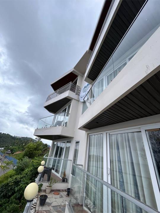Balconies stacked down the cliff