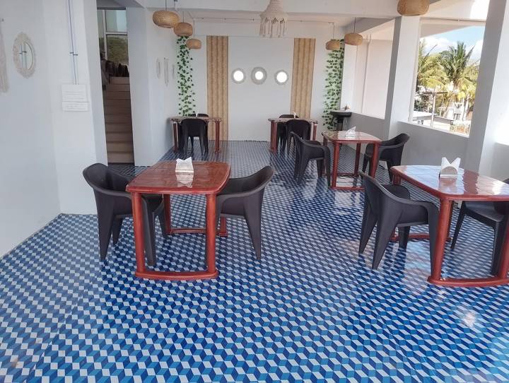 Sea Cliff's open, colourful hilltop restaurant with tiled floor