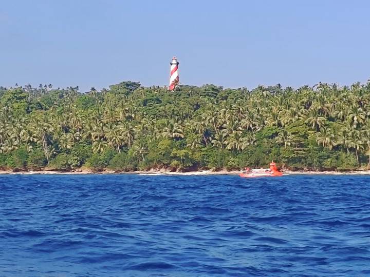 North Bay island lighthouse across blue water
